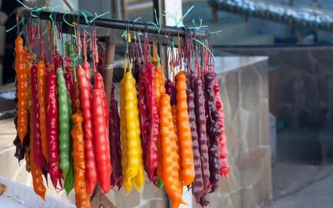 The hanging linking of multi-colored tasty churchkhela Stock Photos