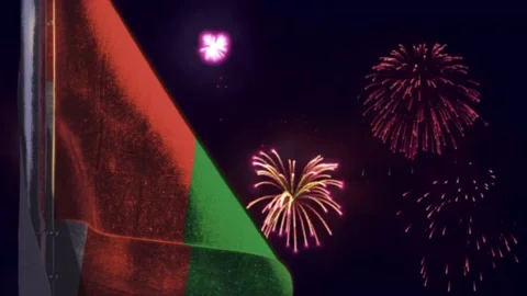 Hanging Oman flag on firework sky bokeh bg Stock Footage 185919407