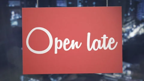 Hanging Open Late Sign Swinging Over City Lights at Night with Luma Matte Stock Footage 346070940