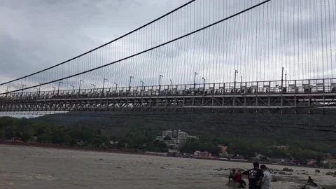 Hanging Over the Holy: The Bridges of Rishikesh Stock Footage 313564502