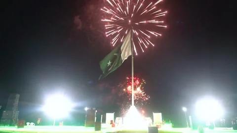 Hanging Pakistan flag on firework sky bokeh background Stock Footage 284442215