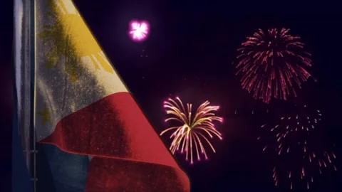 Hanging Philippines flag on fireworks sky bokeh backdrop Stock Footage 283295131