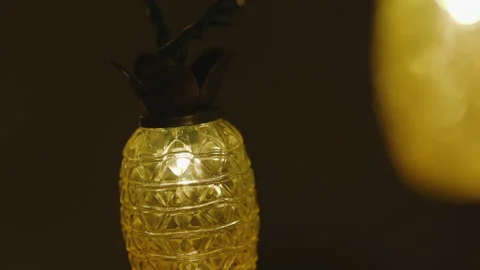 Hanging Pineapple String Lights Swaying, Close Up Stock Footage 139223256