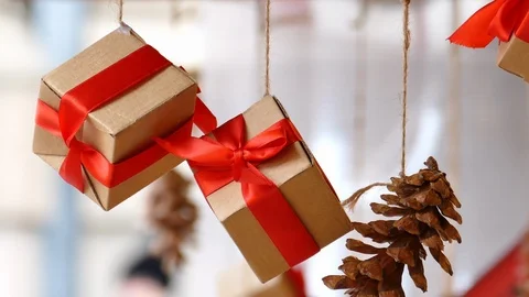 Hanging presents and pine cones Stock-Footage 99700613