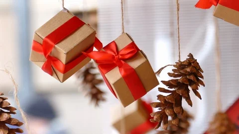 Hanging presents and pine cones 動画素材 99702384