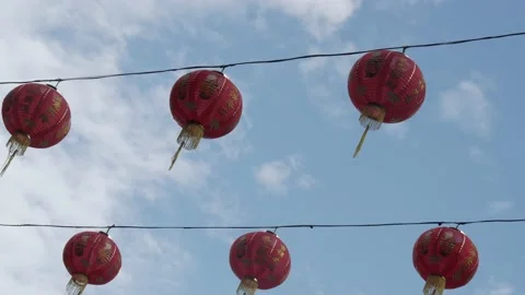 Hanging red Chinese lanterns during Lunar New Year Stock Footage 135968131