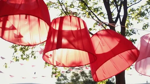 The hanging red lanterns and decorated stuff in the wind Stock Footage 79681461