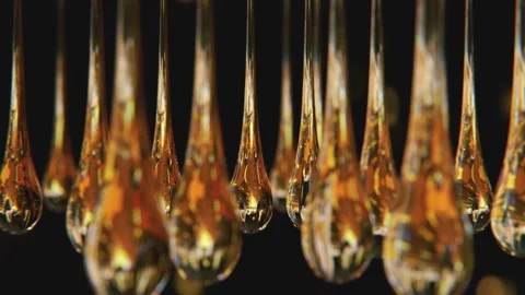 Hanging reflection drops in slow motion and macro Stock Footage 265086177