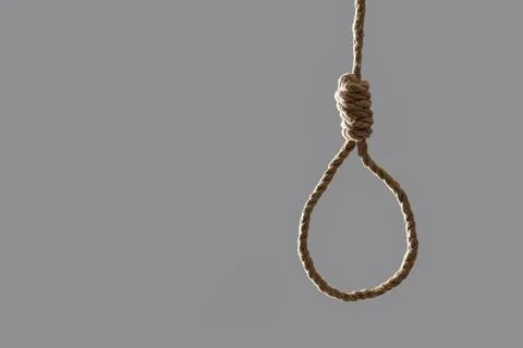 Hanging rope with loop on grey background. Suicide concept Stock-Fotos