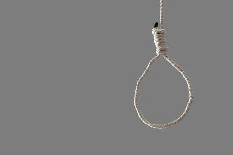 Hanging rope with loop on grey background. Suicide concept Stock Photos