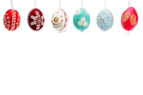 Hanging row of hand painted easter eggs Stock Photos