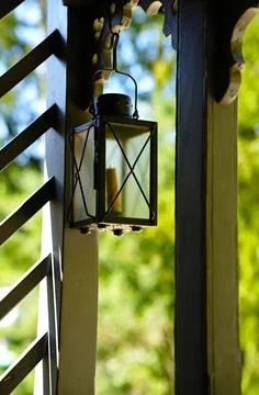 Hanging square glazed candle light. Stock Photos