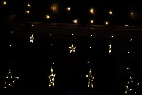 Hanging star shaped string lights Stock Photos