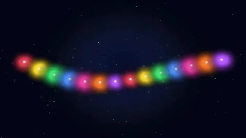 Hanging string of colorful glowing Christmas lights twinkling against dark .. Stock Footage 342723622