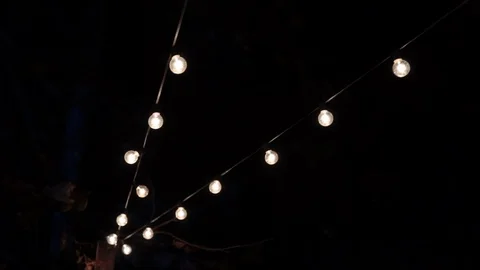 Hanging string lights dynamic night Video stock 97815209