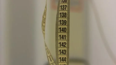 Hanging tape measure Vídeo Stock 53277989