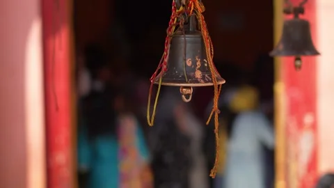 Hanging Temple Bell with Selective Focus at Sacred Hindu Shrine 動画素材 336884461