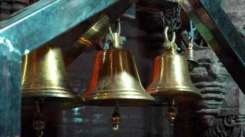 Hanging Temple Bells Ready for Devotional Ritual Stock Footage 334235794
