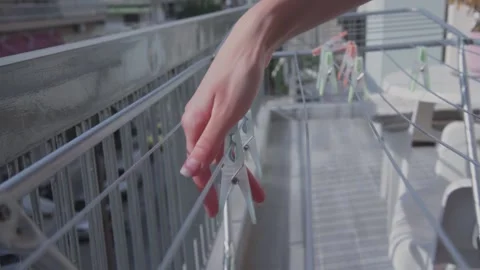 Hanging washed face mask on dryer. Stock Footage 142739400