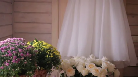 Hanging wedding dress Stock Footage 55030294