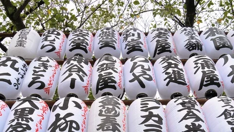 The hanging white lanters inside the Senso-ji Temple in Tokyo Japan Stock Footage 121421525