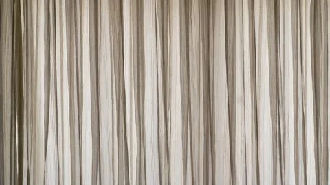 Hanging window curtain as background Stock Photos