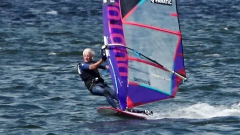 Hanging on your surf sail in strong wind Video stock 252176873