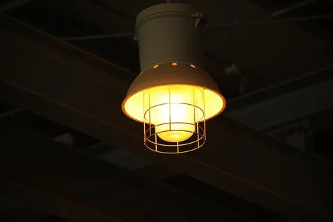 A,Hanging,Bright,Yellow,Bulb Stock Photos