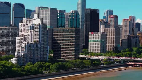 Hangzhou, China - July 07, 2025: A daytime aerial showcases the tall, modern Stock Footage 314114341
