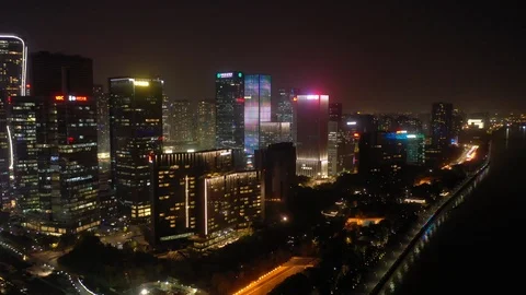Hangzhou night time illumination riverside traffic bay aerial panorama 4k china Stock Footage 125488568