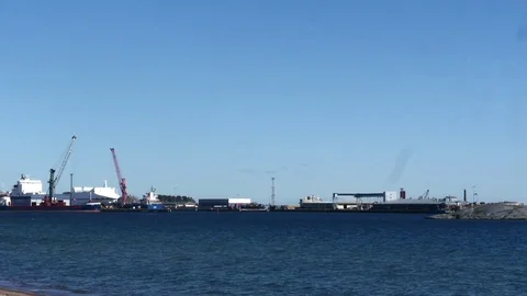 Hanko,  Pan time lapse of cranes and ships at lansi-satama, filmed from tul.. Stock Footage 74193838