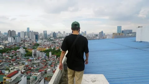 Hanoi Cityscape while walking on a roof Stock Footage