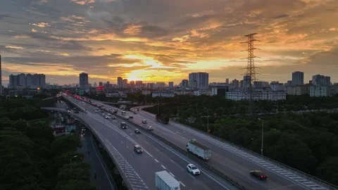 Hanoi Ring Road 3 Through Yen So at Sunset with Urban Traffic and City Skyline Vídeos de archivo 344742997