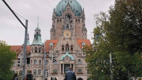 HANOVER, GERMANY - October 2018: Unrecognized pedestrians cross the road. Street Stock Footage 107363445