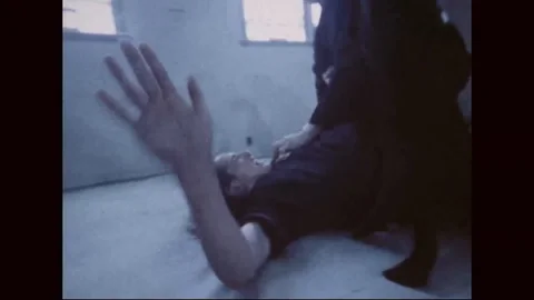 Hap Ki Do students warm up with various exercises of martial art - 1977 Video stock 97905192