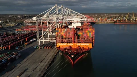 Hapag-Lloyd container ship bow at Southampton UK at sunset aerial Stock Footage 279896269