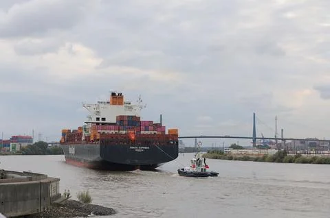 Hapag-Lloyd Container ship at Elbe river leaving port of Hamburg. Stock Photos