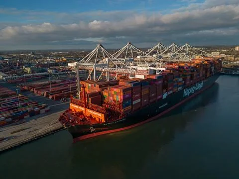 Hapag-Lloyd container ship at sunset Southampton Docks UK Stock Photos