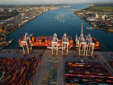 Hapag-Lloyd container ship at sunset Southampton Marchwood aerial Stock Photos