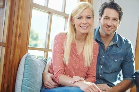 Happiness is better when its shared. a happy couple enjoying a leisurely day at Stock Photos