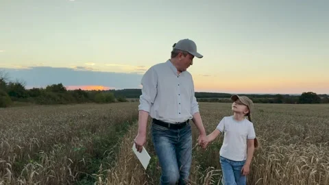 Happiness found in the fields, a father and daughter share a special bond Stock Footage 311897329