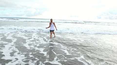 Happiness in the sea waves Stock Footage 17360074