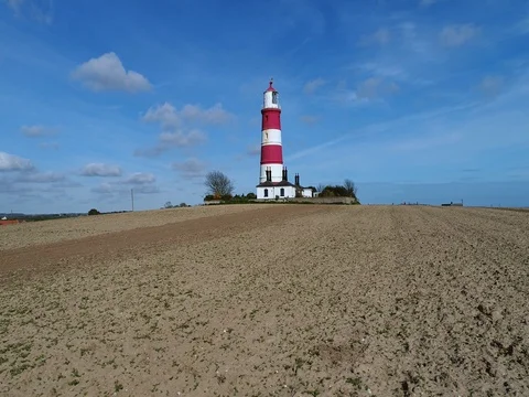 Happisburgh lighthouse, Norfolk, UK Stock Footage 74740227