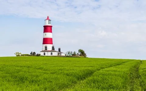 Happisburgh lighthouse on top of a hill Stock Photos