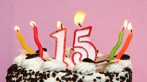 Happy 15 birthday with cake and candles on pink background Stock Footage