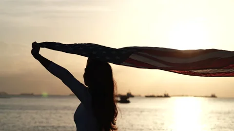 Happy 4th of July Independence Day. Women holding USA American flag waving Stock-Footage 156830703