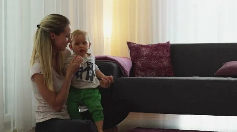 Happy about babys first steps Video stock 42868599