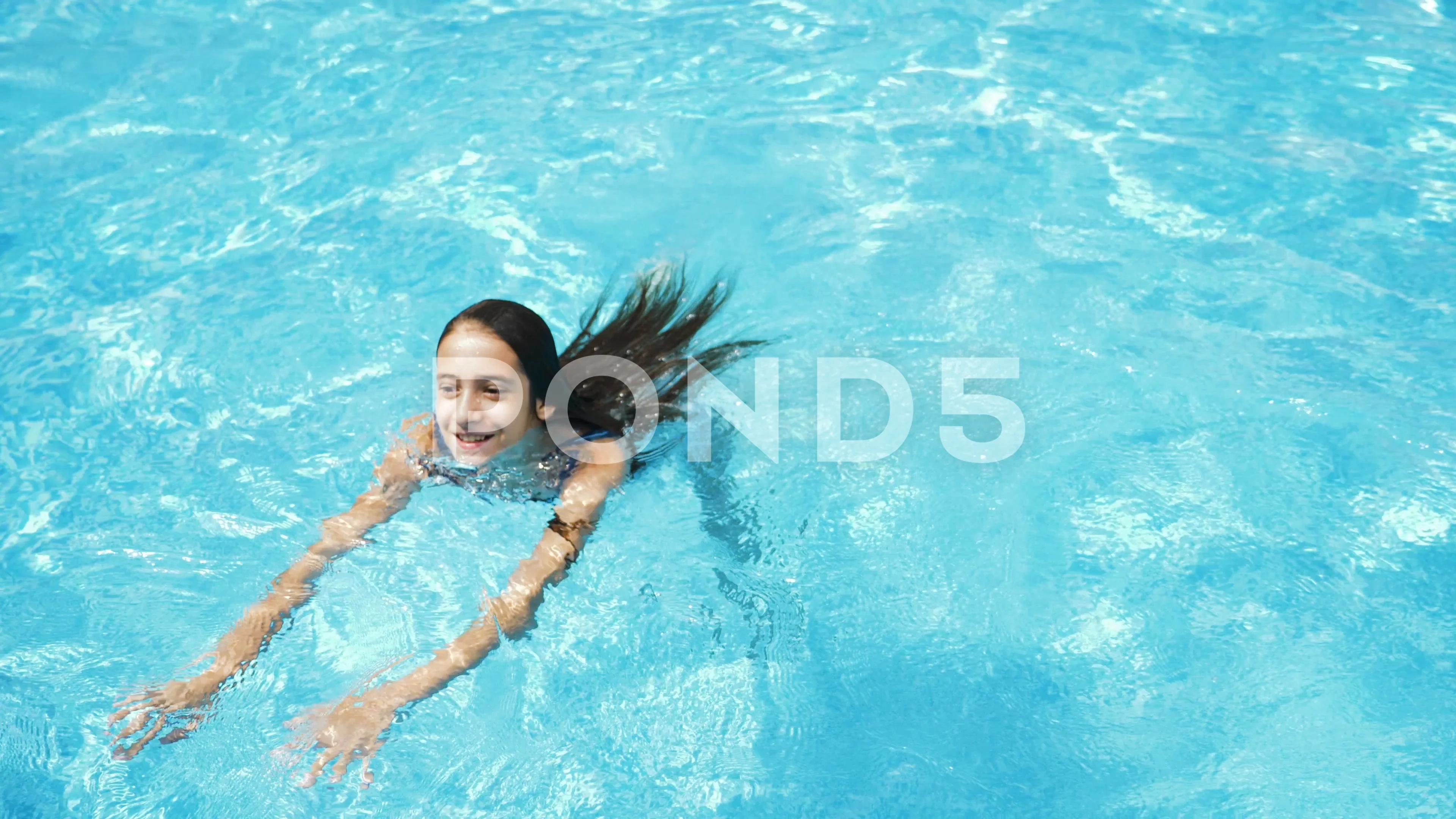 Happy active teen girl in the swimming p, Stock Video