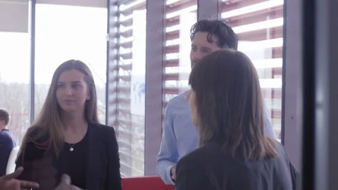 Happy active workers enjoying the pause having a discussion Stock Footage 73895896