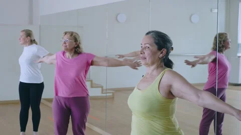 Happy adults training swing steps at dance class Stock Footage 252051255
